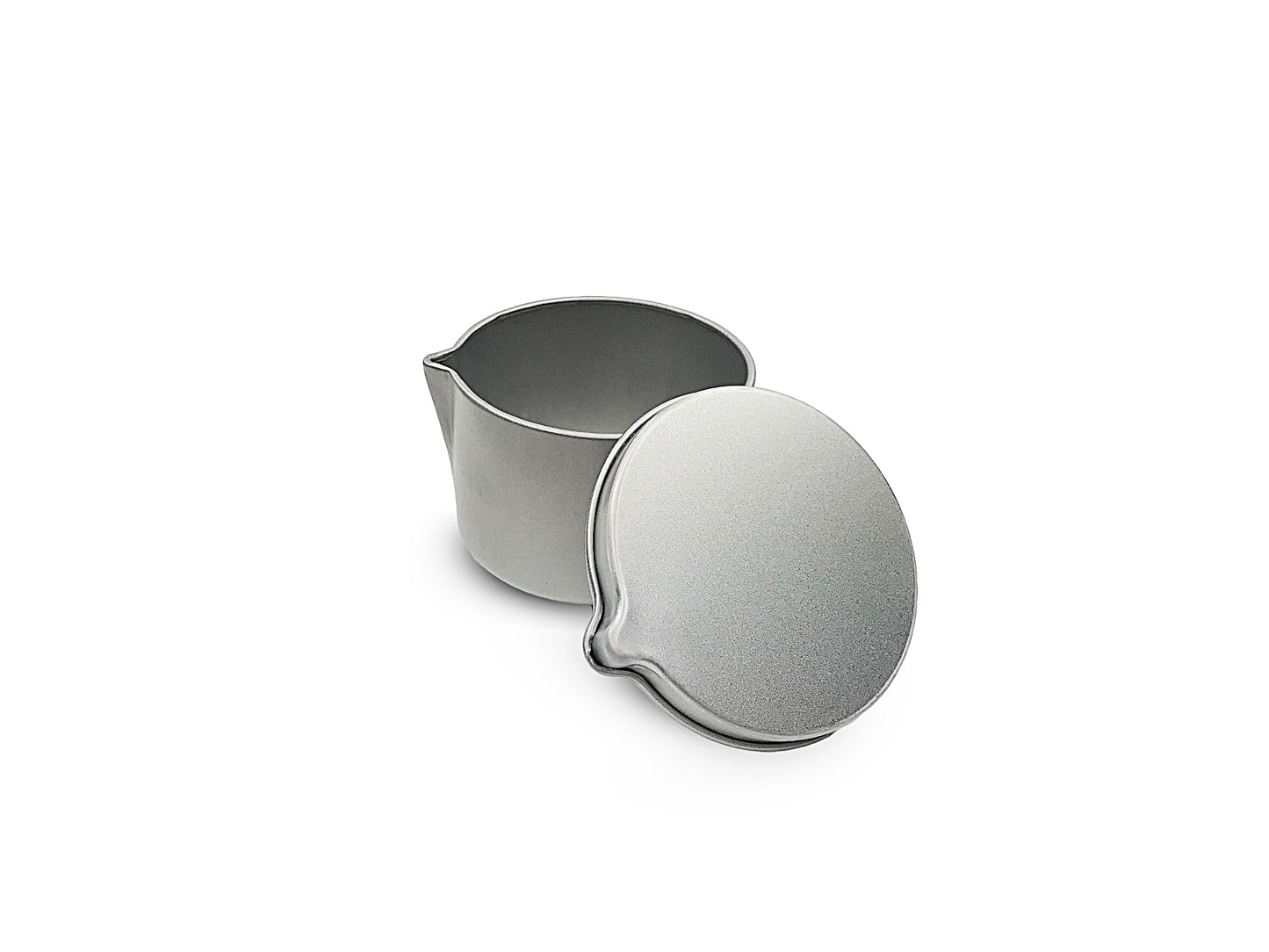 Tin for massage candles that has a pouring spout